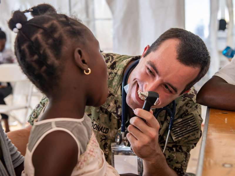 child getting checkup